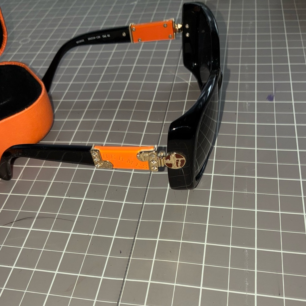 Stylish Black Sunglasses with Orange Case